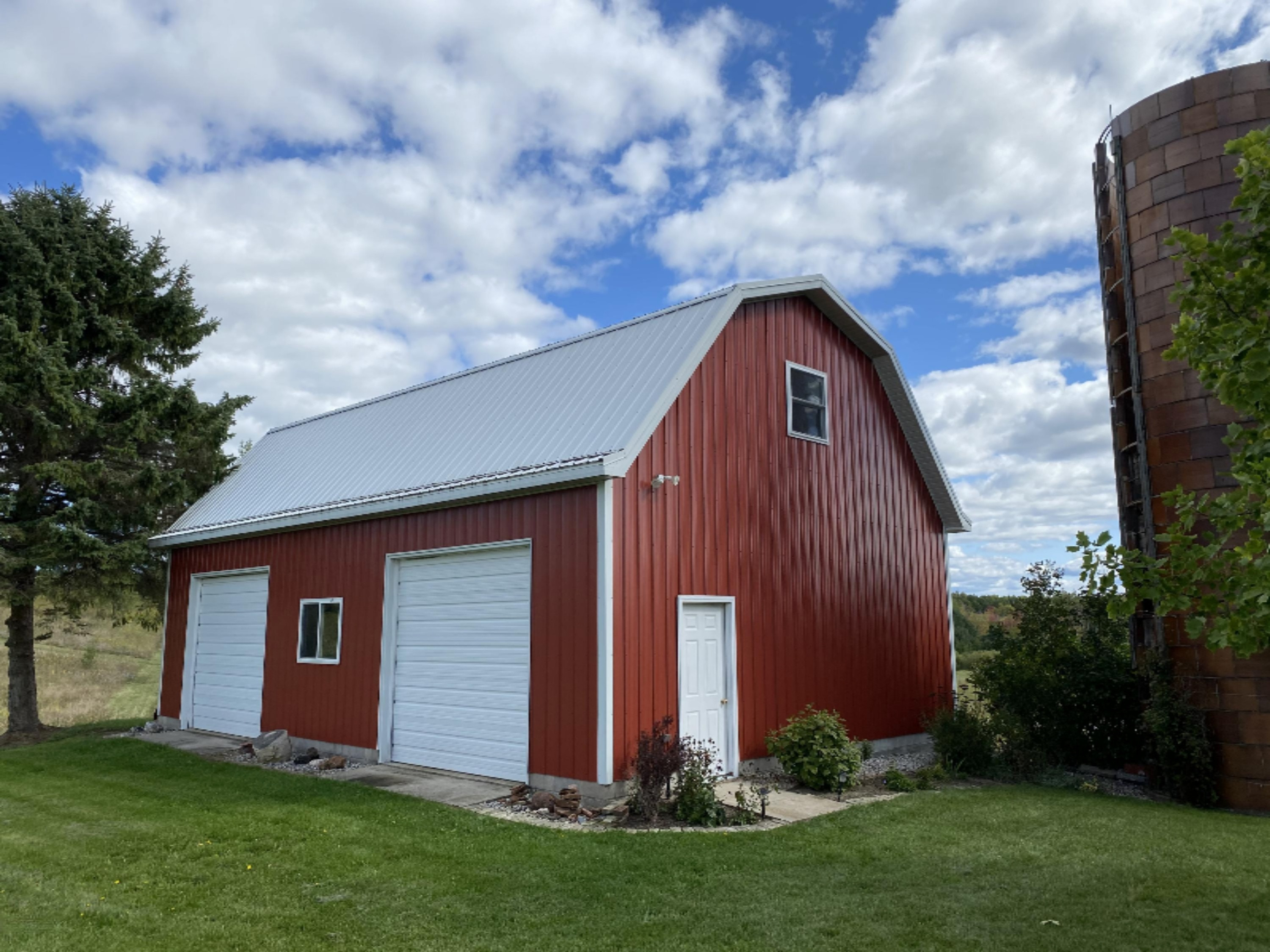 7123 Adamson Lake Road Kaleva, MI 49645 - Photo 4 of 59 26 x 40 2-Story Barn w/ 9-ft doors