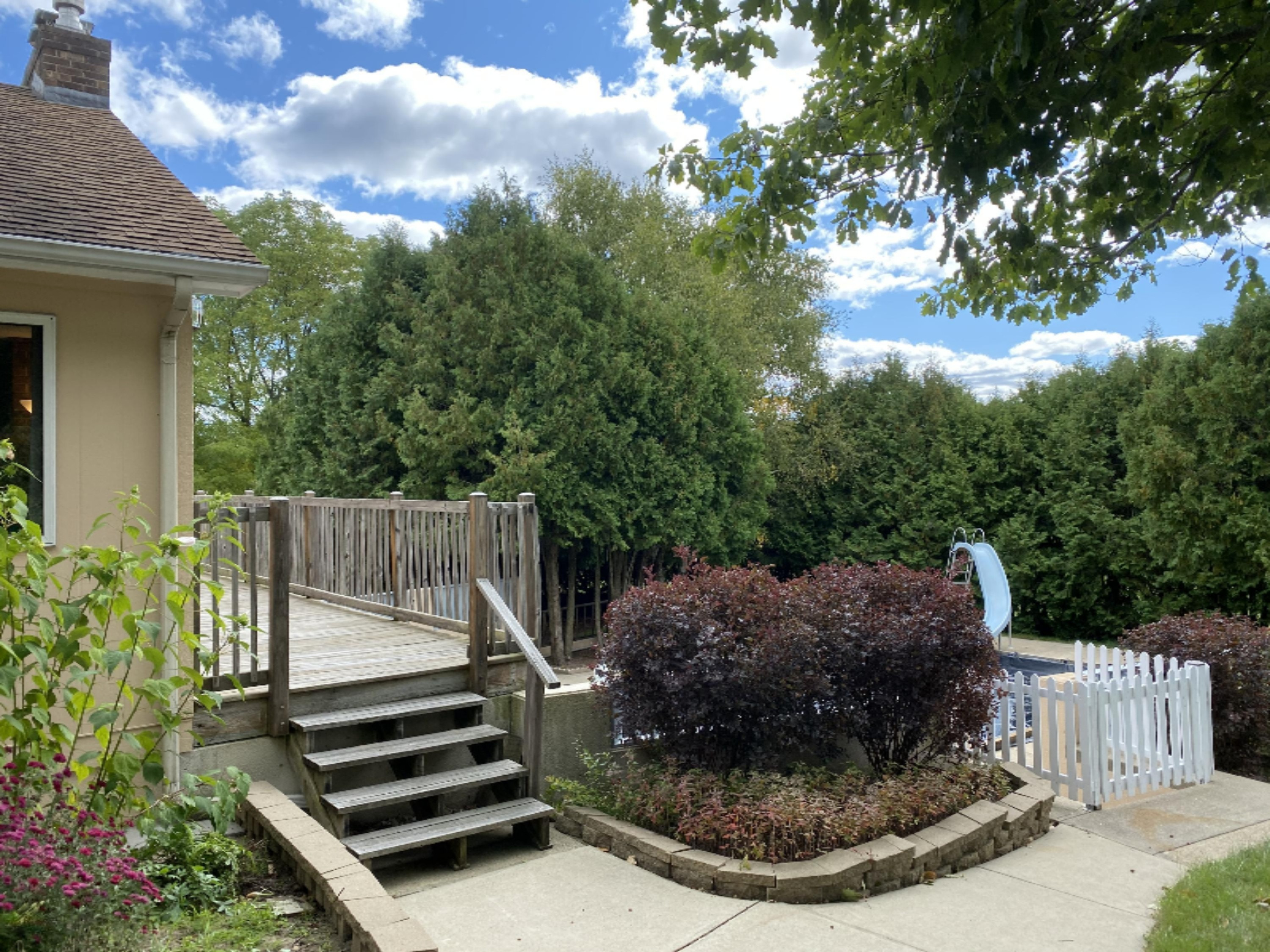 7123 Adamson Lake Road Kaleva, MI 49645 - Photo 45 of 59 Side Deck overlooking Pool