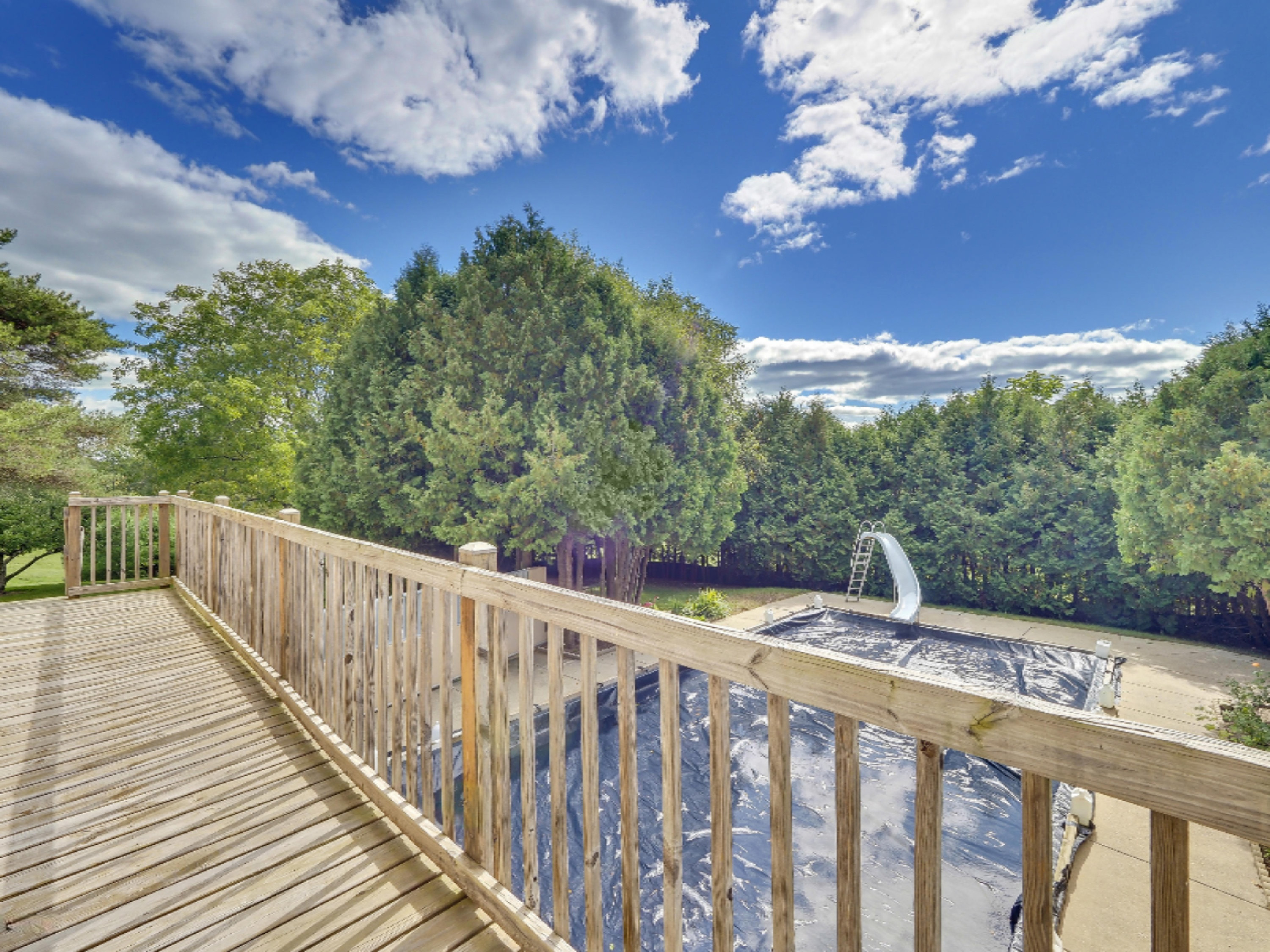 7123 Adamson Lake Road Kaleva, MI 49645 - Photo 46 of 59 Deck overlooking Pool