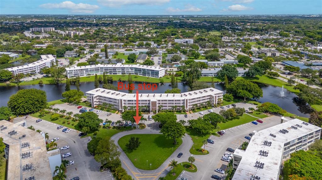 3028 Cambridge B, Unit 3028 Deerfield Beach, FL 33442 - Photo 32 of 49 an aerial view of multiple house