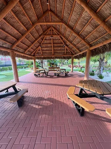 a view of patio with wooden floor