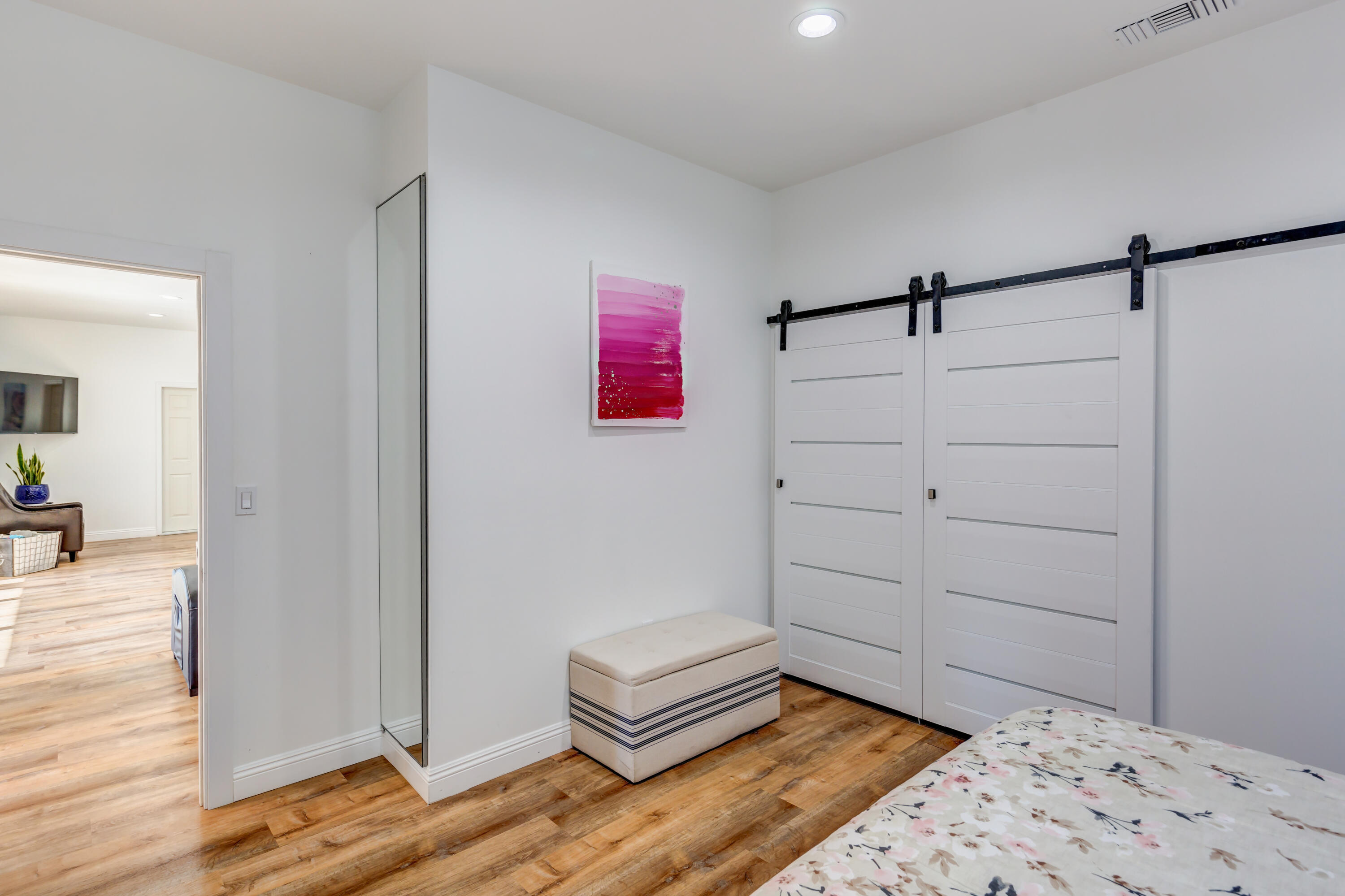 70181 Chappel Road Rancho Mirage, CA 92270 - Photo 16 of 43 a bedroom with a bed and a dresser