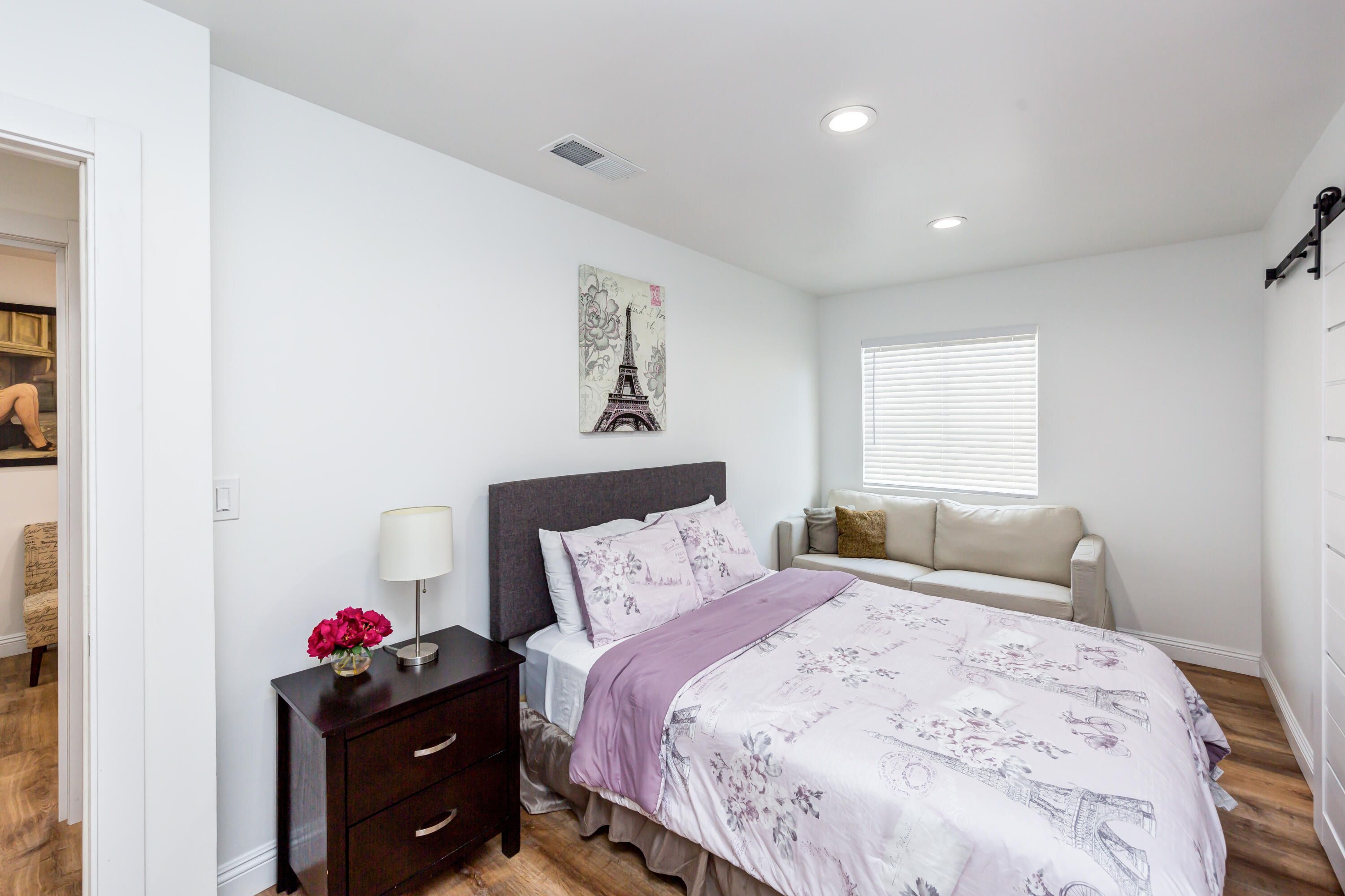 70181 Chappel Road Rancho Mirage, CA 92270 - Photo 24 of 43 a bedroom with a bed and cabinets