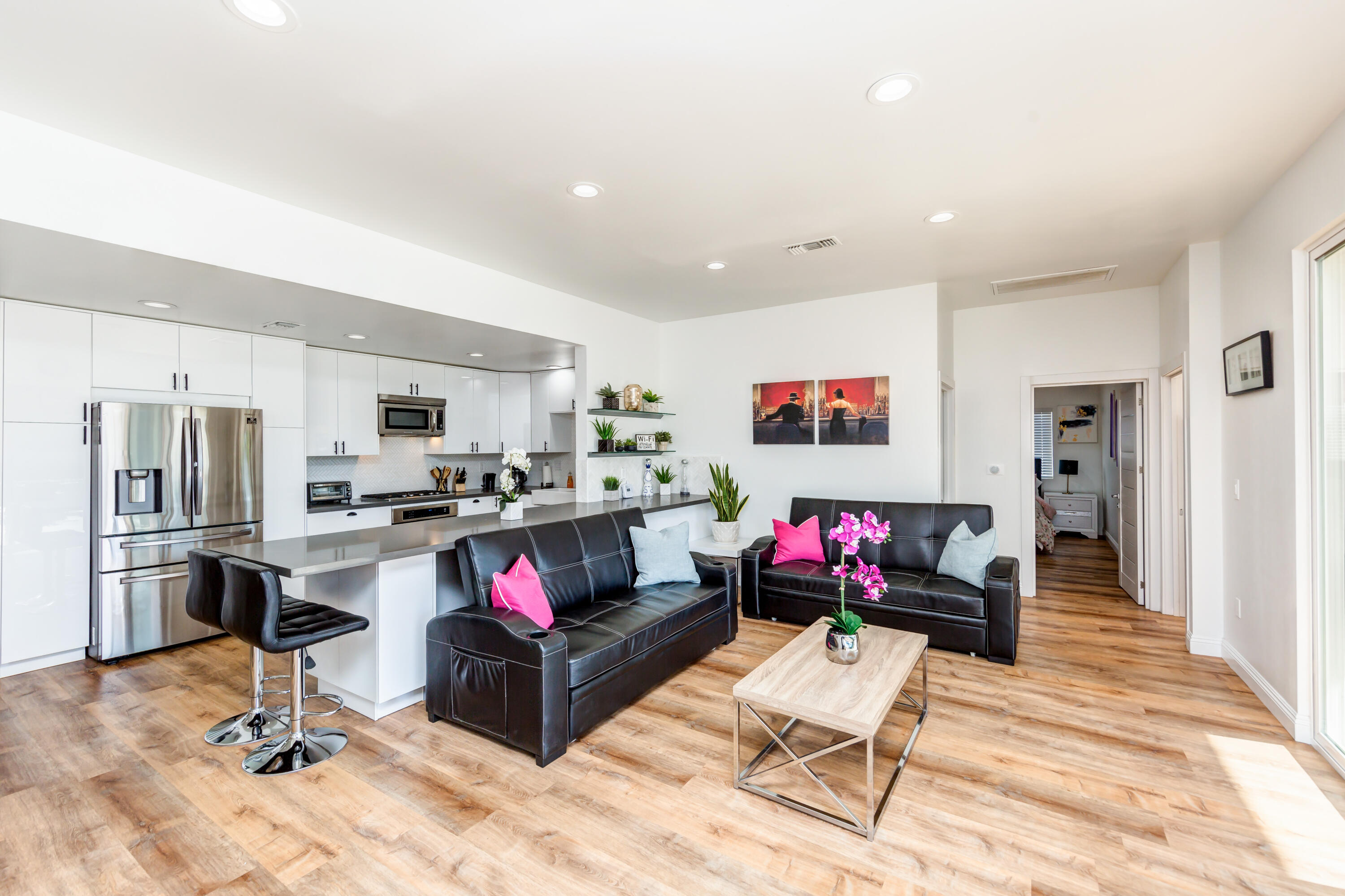 70181 Chappel Road Rancho Mirage, CA 92270 - Photo 28 of 43 a living room with stainless steel appliances kitchen island granite countertop furniture and a kitchen view