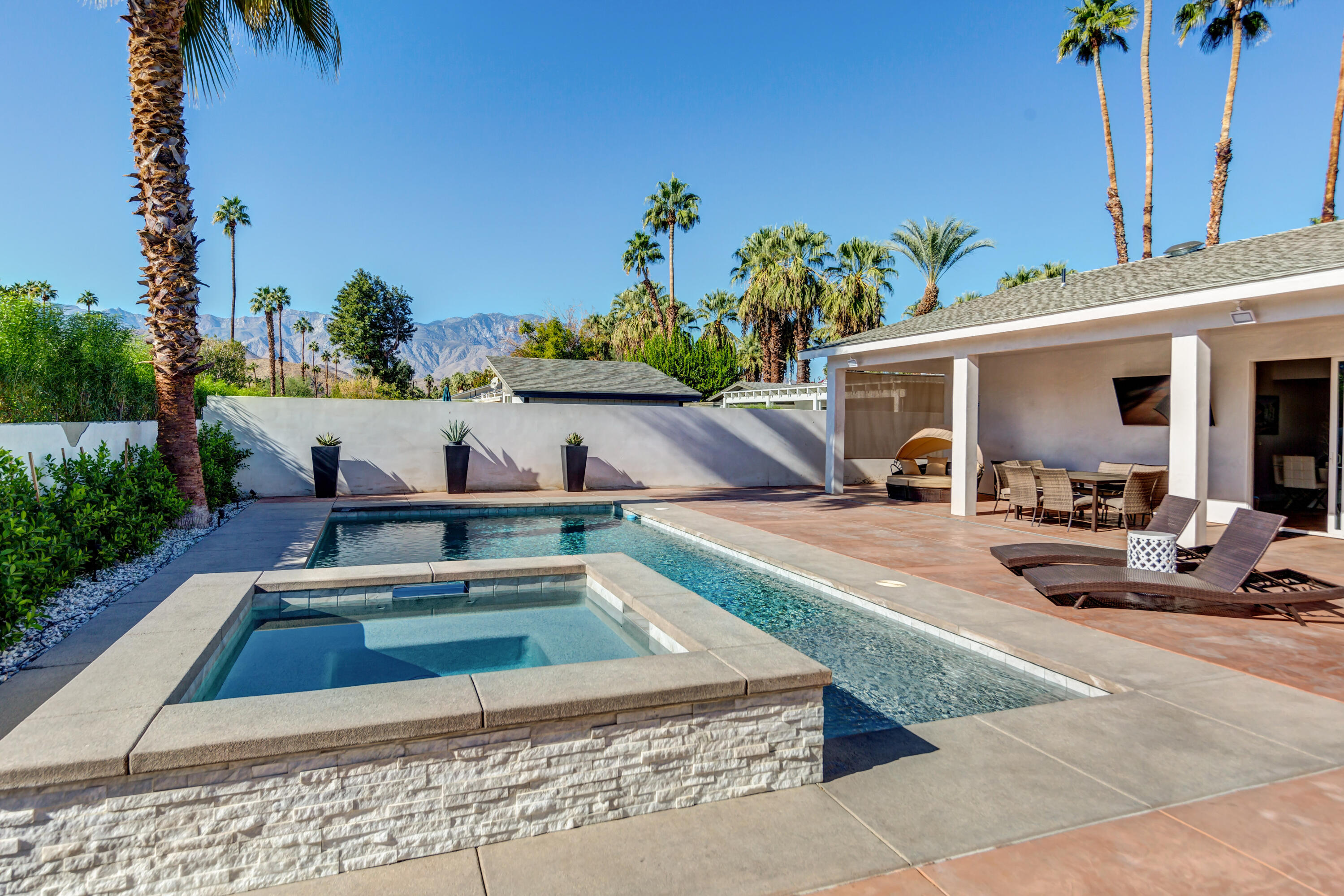 70181 Chappel Road Rancho Mirage, CA 92270 - Photo 3 of 43 a view of a swimming pool with lounge chair