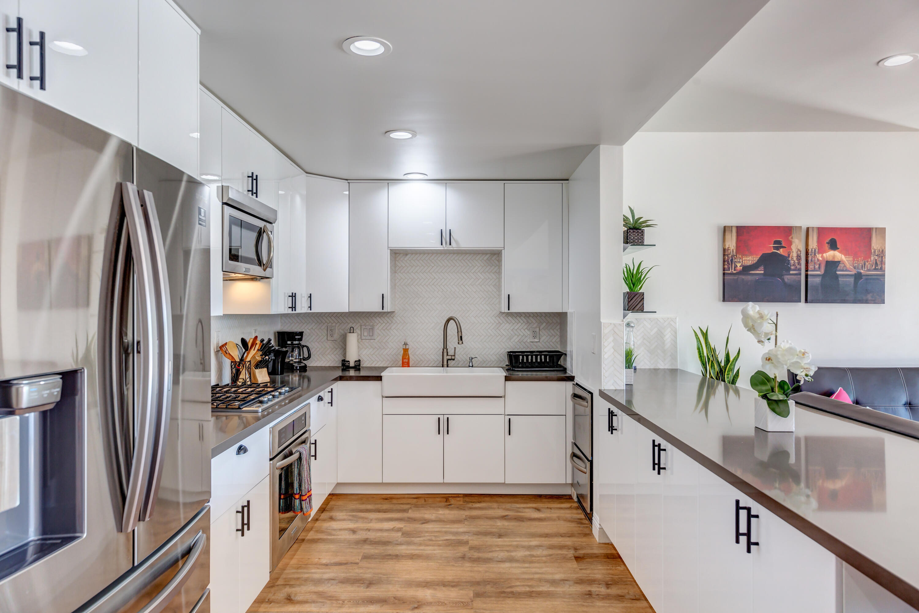 70181 Chappel Road Rancho Mirage, CA 92270 - Photo 34 of 43 a kitchen with a sink stainless steel appliances and cabinets