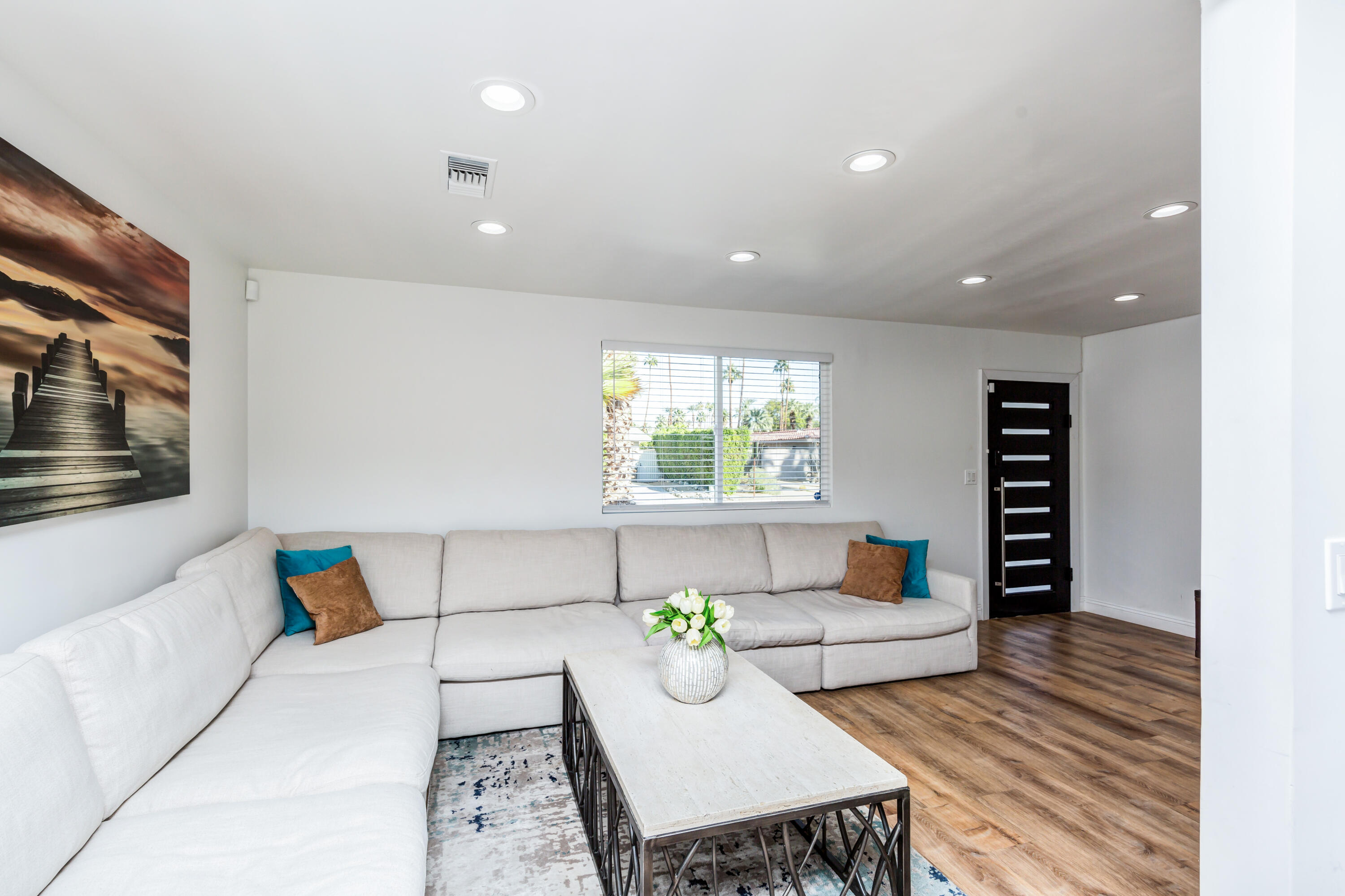 70181 Chappel Road Rancho Mirage, CA 92270 - Photo 35 of 43 a living room with furniture and window