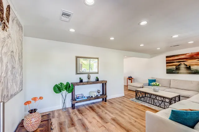 a view of a swimming pool with a lake view