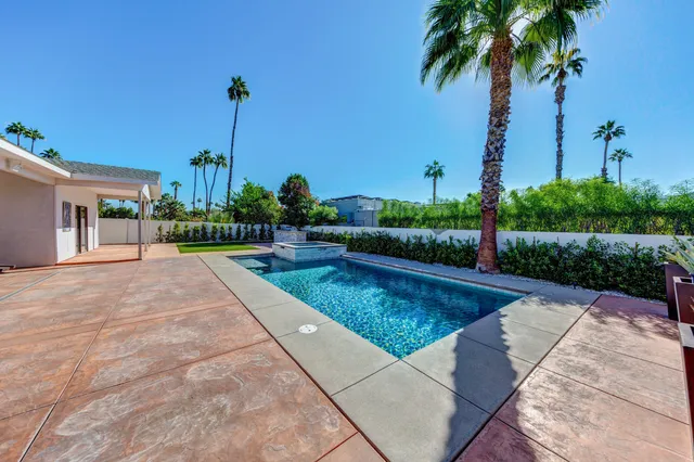 a view of a terrace with a garden
