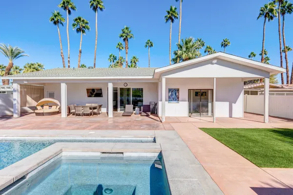 a house view with a garden space