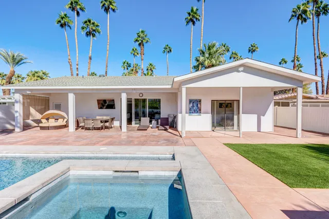 a house view with a garden space