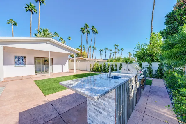 a view of a house with a patio