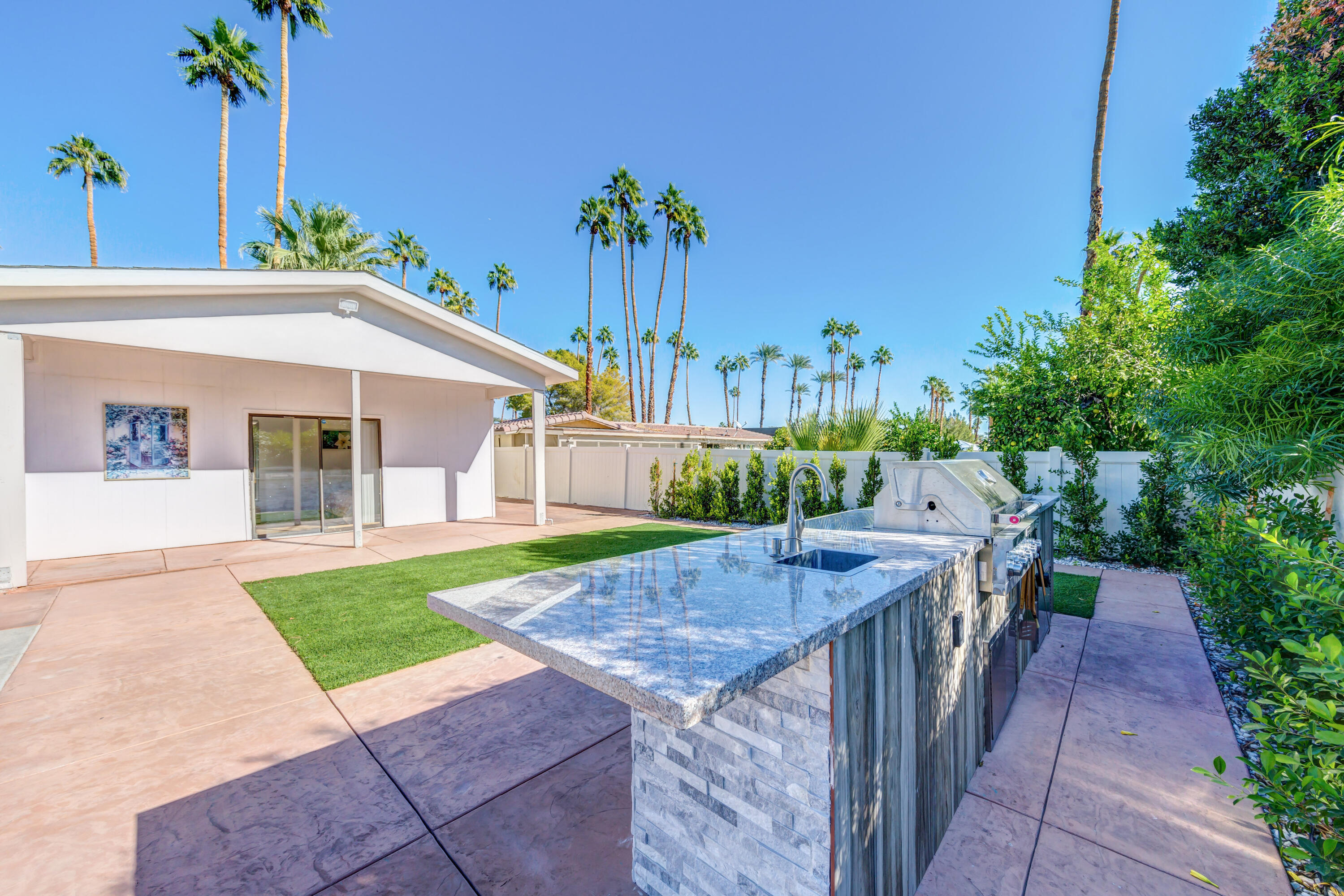 70181 Chappel Road Rancho Mirage, CA 92270 - Photo 8 of 43 a view of a house with a patio