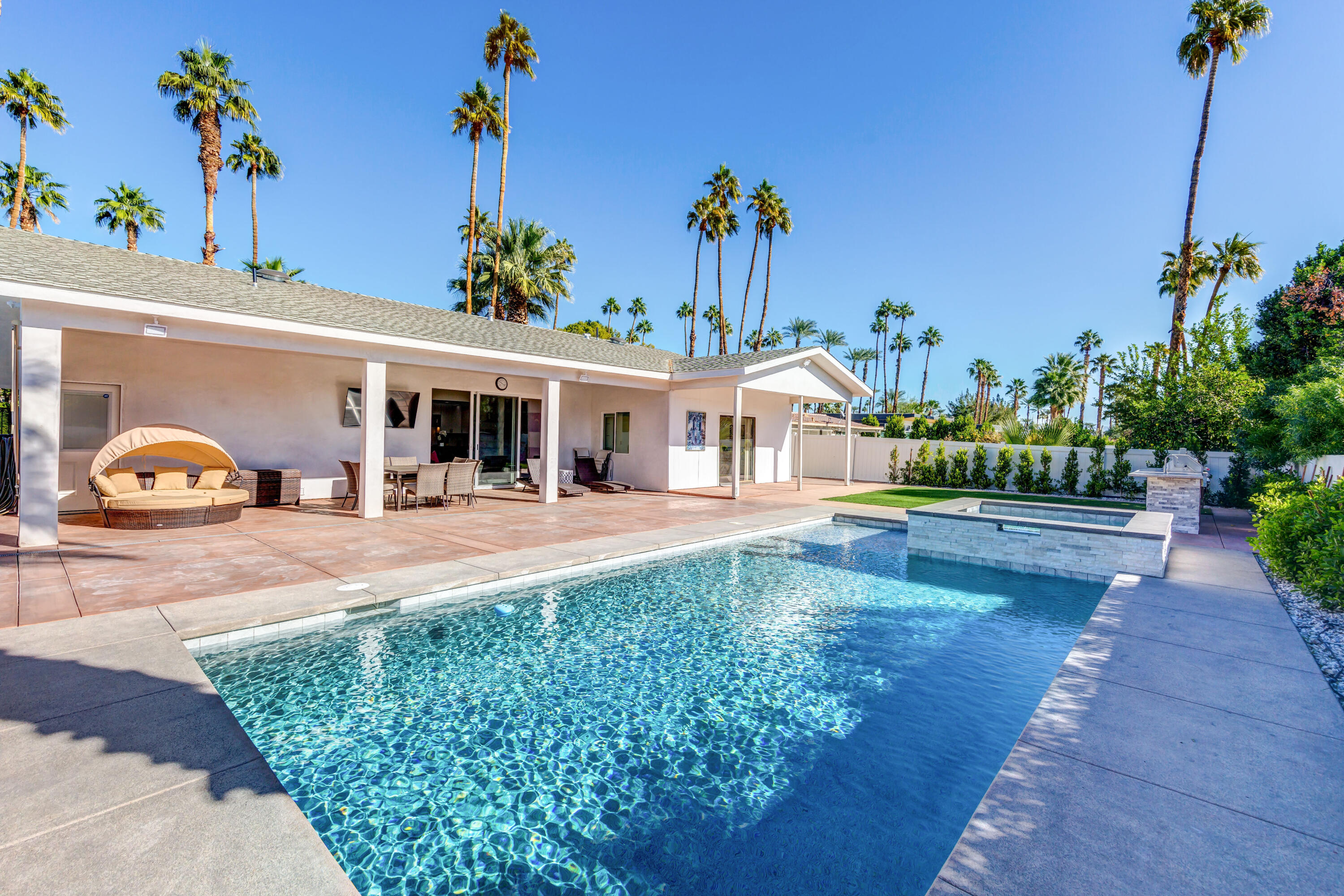 70181 Chappel Road Rancho Mirage, CA 92270 - Photo 10 of 43 a front view of a house with a yard