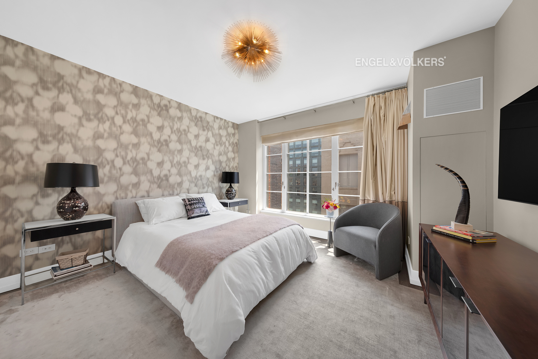 70 Charlton Street, Unit 21C Manhattan, NY 10014 - Photo 7 of 22 a bedroom with a bed chair and a window