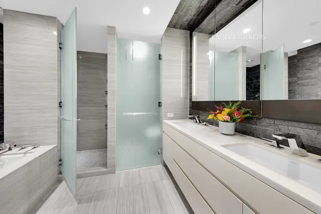 a bedroom with a bed chair and a window