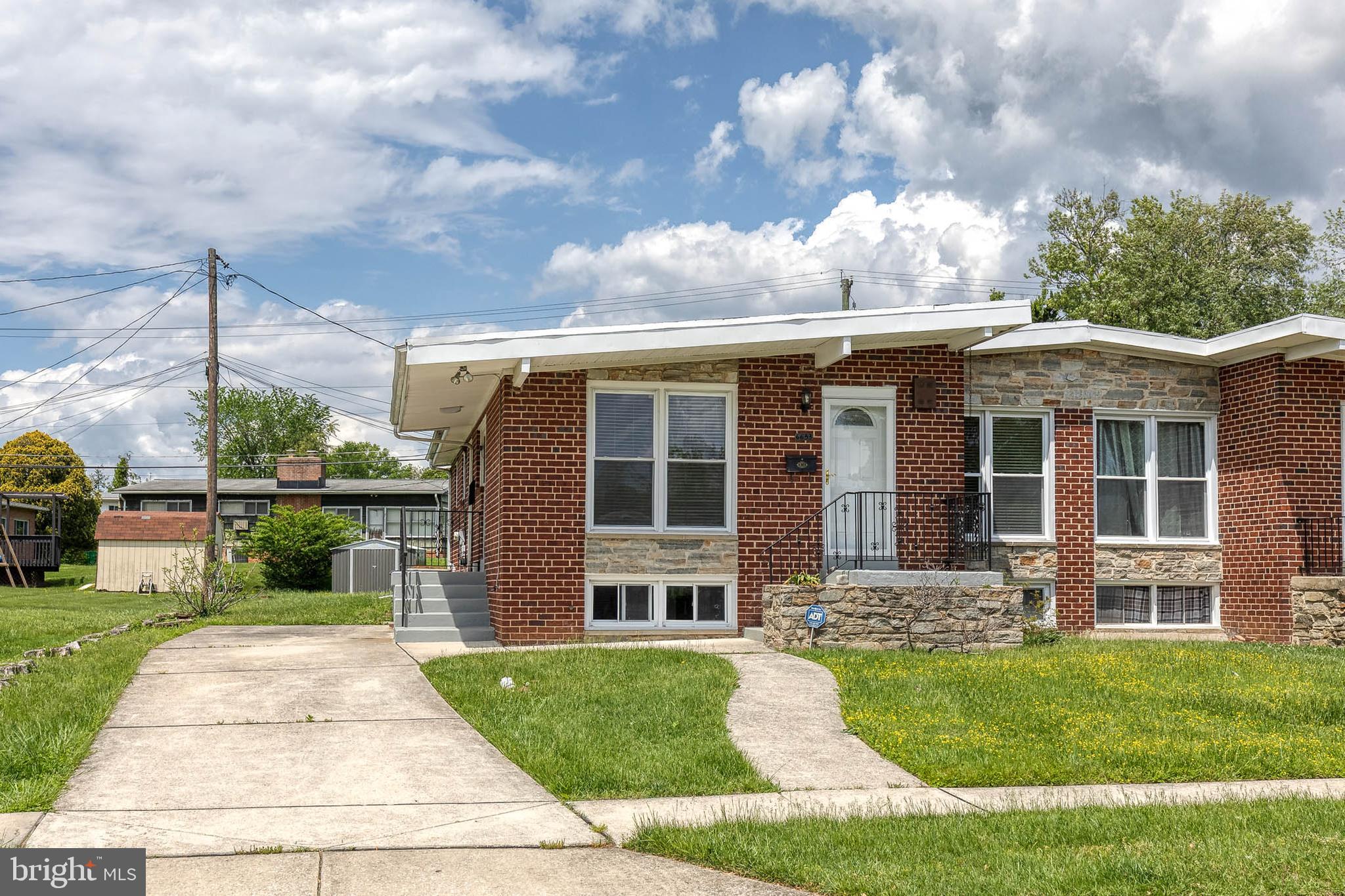 a view of a house with a garden