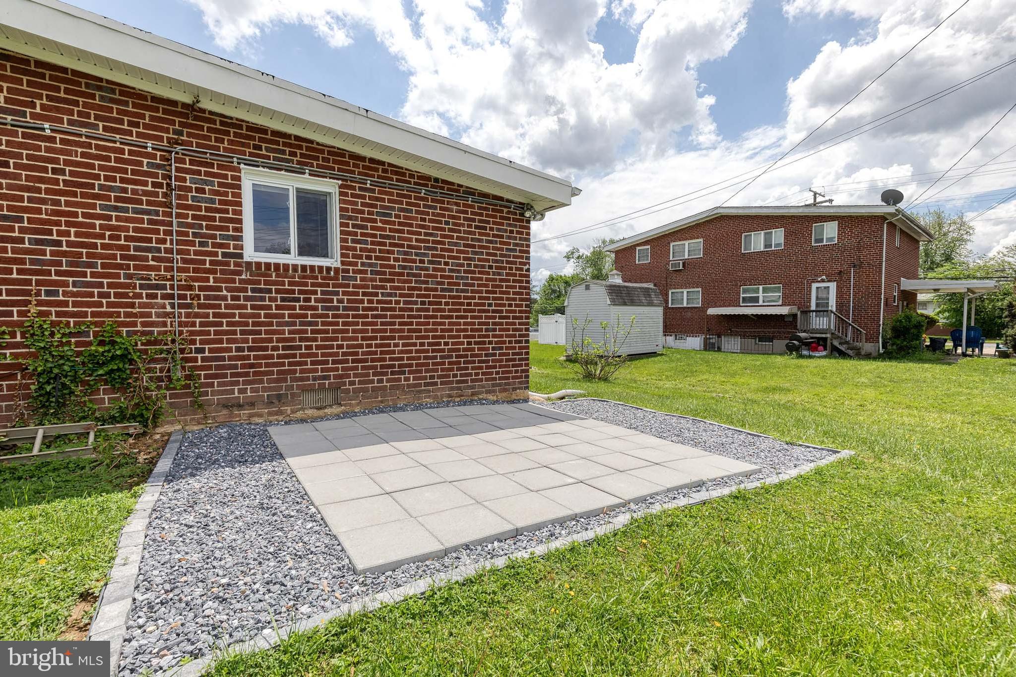 6653 Chippewa Drive Baltimore, MD 21209 - Photo 24 of 24 a front view of a house with a yard