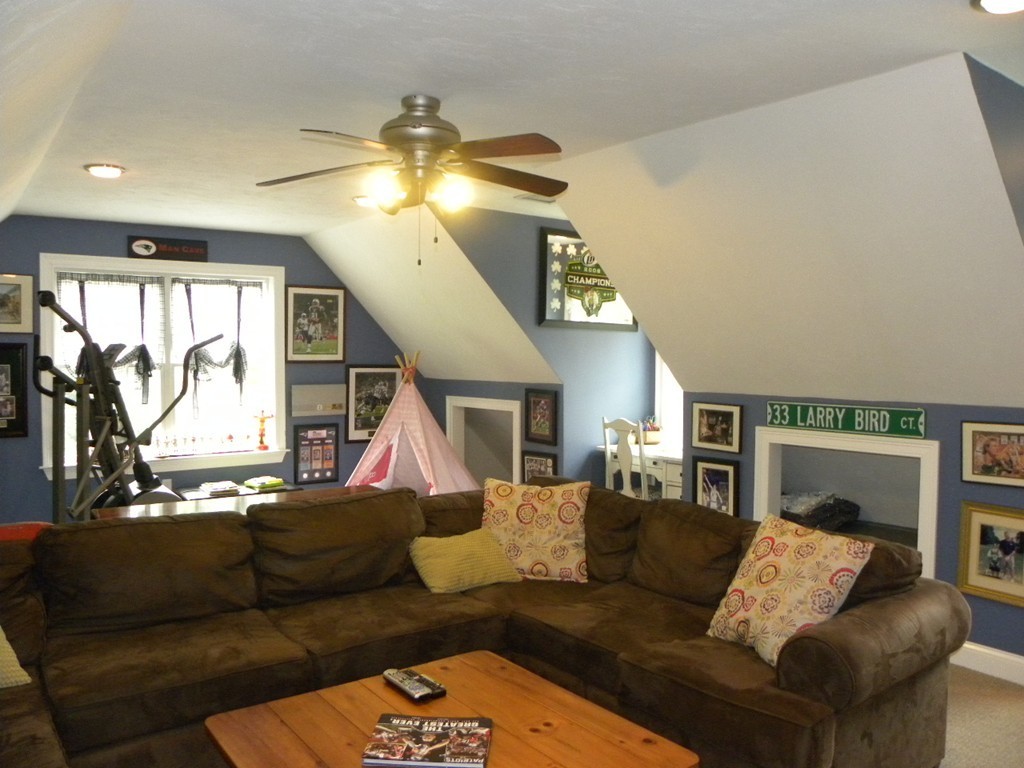 57 McIntyre Road Charlton, MA 01507 - Photo 12 of 30 a living room with furniture and a large window