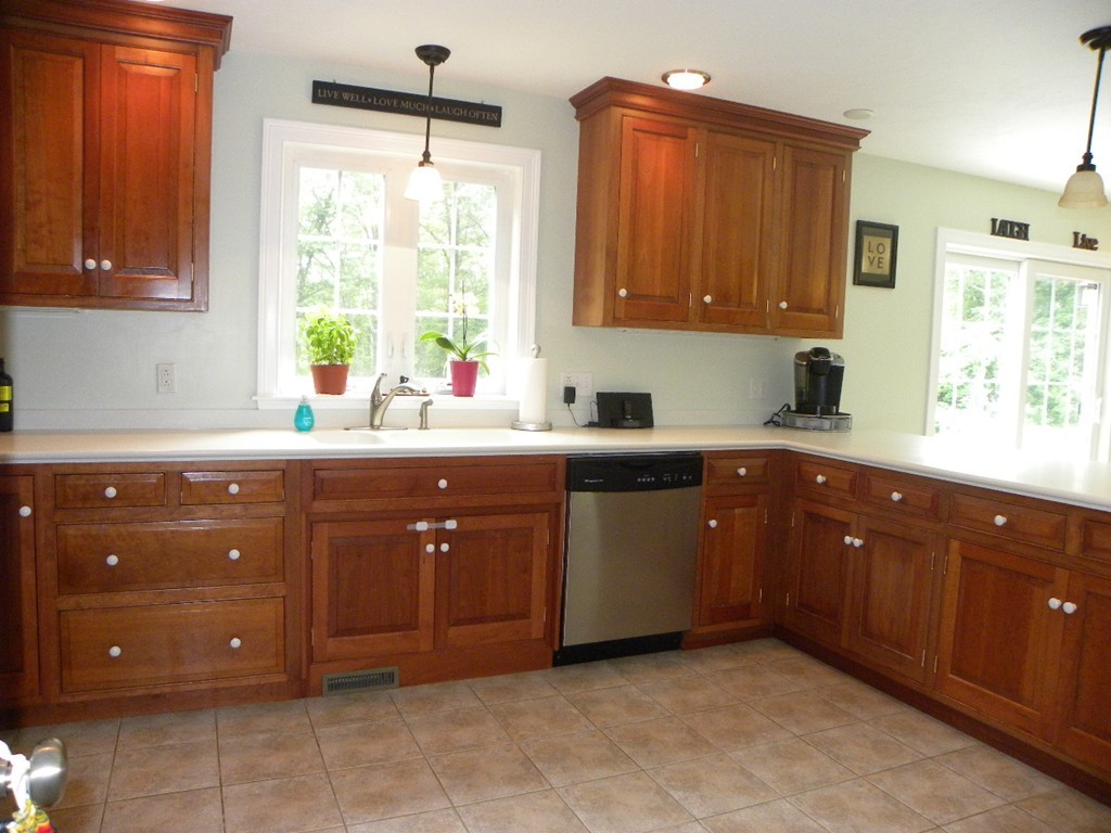 57 McIntyre Road Charlton, MA 01507 - Photo 15 of 30 a kitchen with a sink window and cabinets