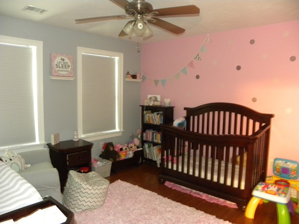 57 McIntyre Road Charlton, MA 01507 - Photo 18 of 30 a bedroom with furniture and wooden floor