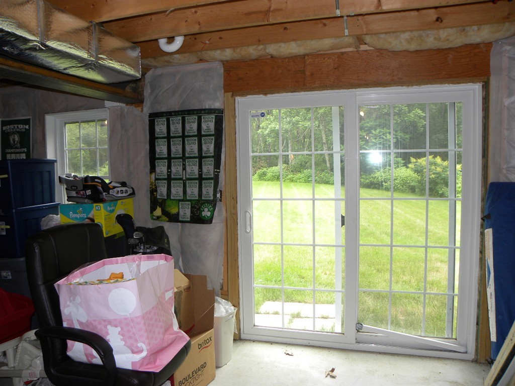 57 McIntyre Road Charlton, MA 01507 - Photo 19 of 30 a bed room with a bed and a window