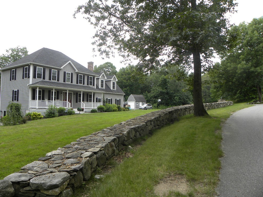 57 McIntyre Road Charlton, MA 01507 - Photo 25 of 30 a view of a house with a yard