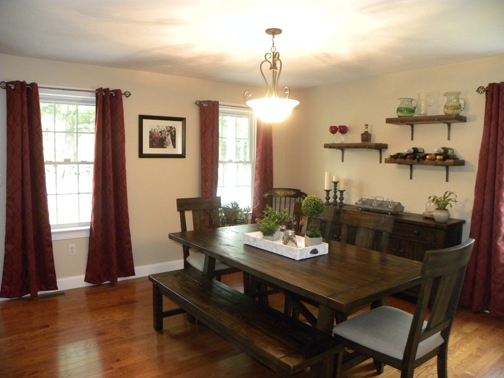 57 McIntyre Road Charlton, MA 01507 - Photo 6 of 30 a view of a dining room with furniture and window