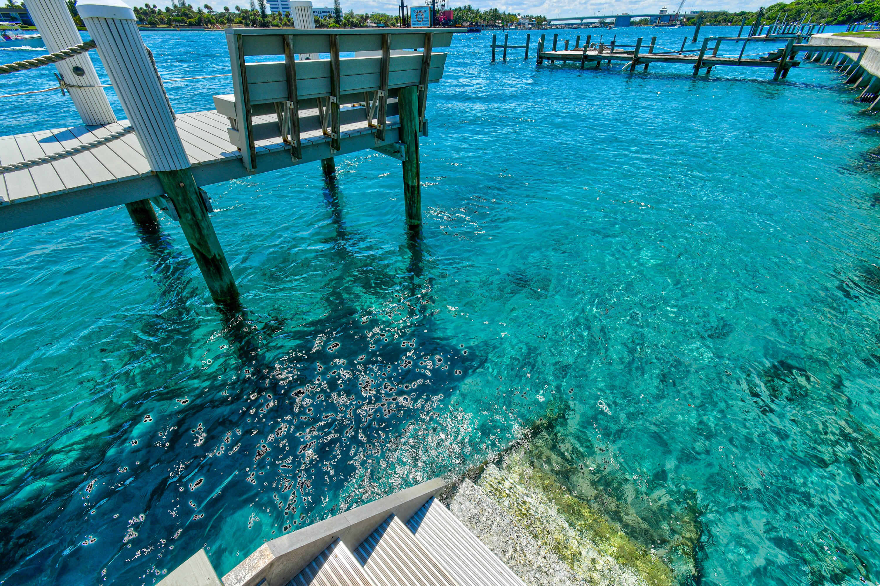 87 Lighthouse Drive Jupiter Inlet Colony, FL 33469 - Photo 20 of 31 a view of yard with seating area and slide