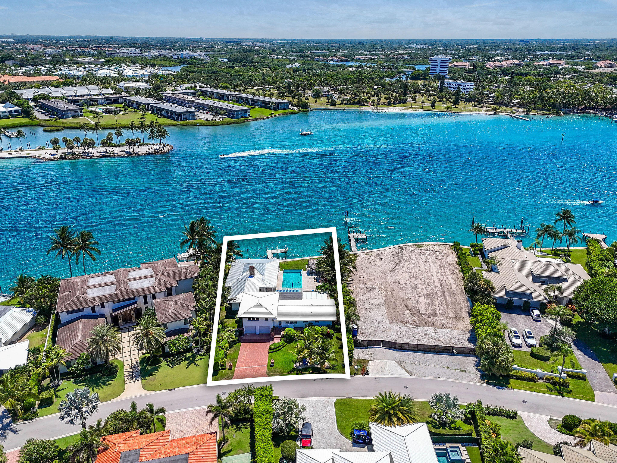 87 Lighthouse Drive Jupiter Inlet Colony, FL 33469 - Photo 4 of 31 an aerial view of residential houses with outdoor space and ocean view