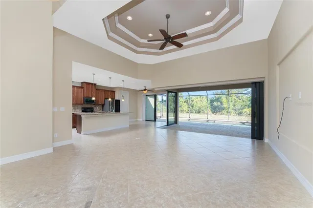 a view of a backyard with a swimming pool