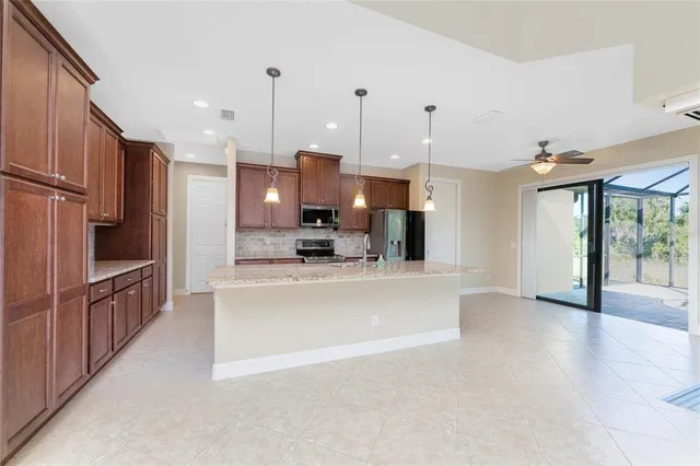 a view of an empty room with glass door