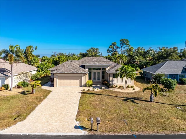 a view of a livingroom with furniture and hardwood floor