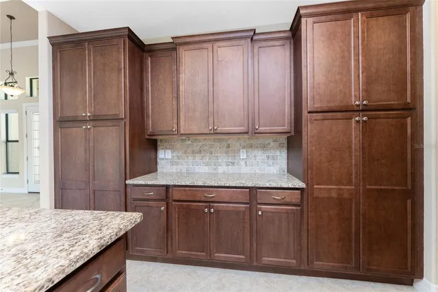 a view of a hallway with a wooden door
