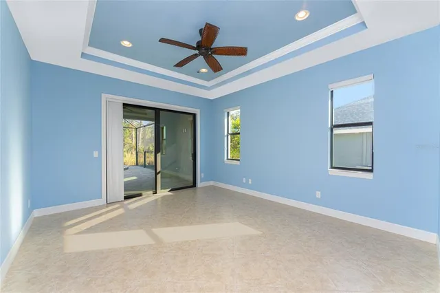 a kitchen with granite countertop a sink and cabinets