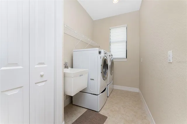 a bathroom with a granite countertop sink a toilet and a mirror