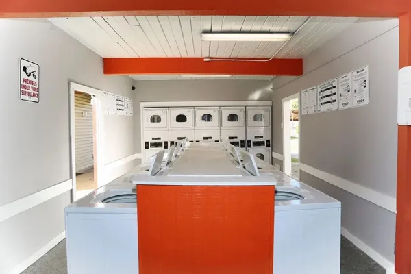 a dining room with large window