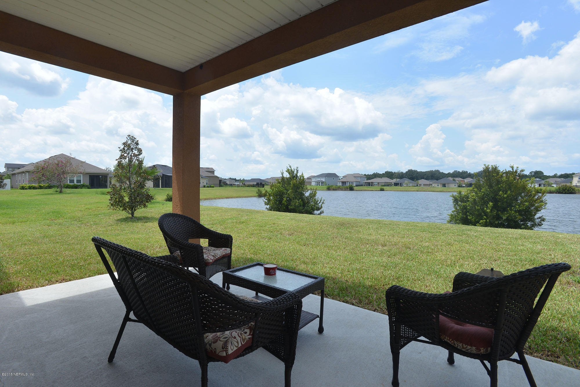 15703 Tisons Bluff Road Jacksonville, FL 32218 - Photo 31 of 42 Covered Lanai to lake view