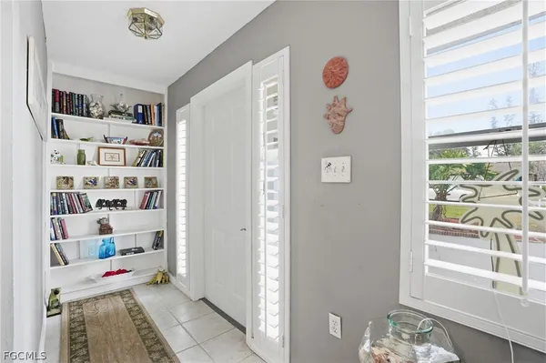 a view of a livingroom with shelves