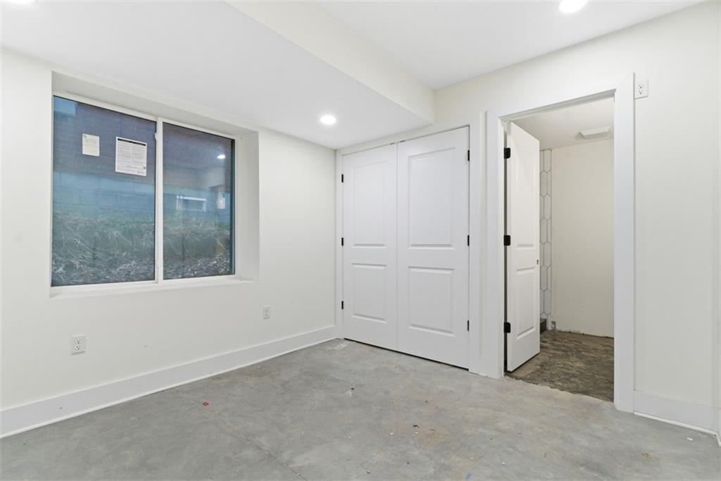 1361 Hawthorne Street Pittsburgh, PA 15201 - Photo 19 of 50 an empty room with windows and closet