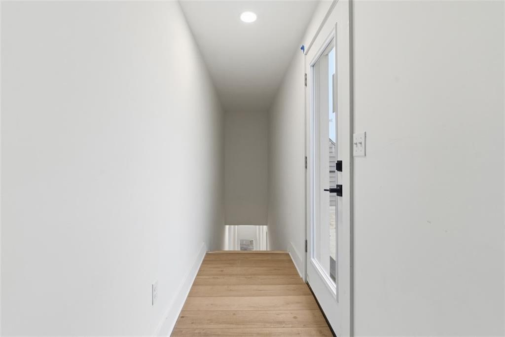 1361 Hawthorne Street Pittsburgh, PA 15201 - Photo 20 of 50 a view of a hallway with wooden floor