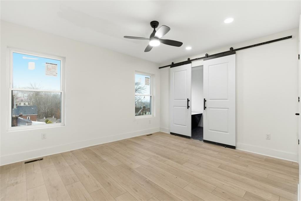 1361 Hawthorne Street Pittsburgh, PA 15201 - Photo 37 of 50 a view of an empty room with a window