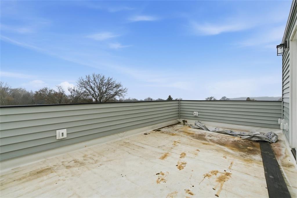 1361 Hawthorne Street Pittsburgh, PA 15201 - Photo 41 of 50 a view of a yard with wooden fence