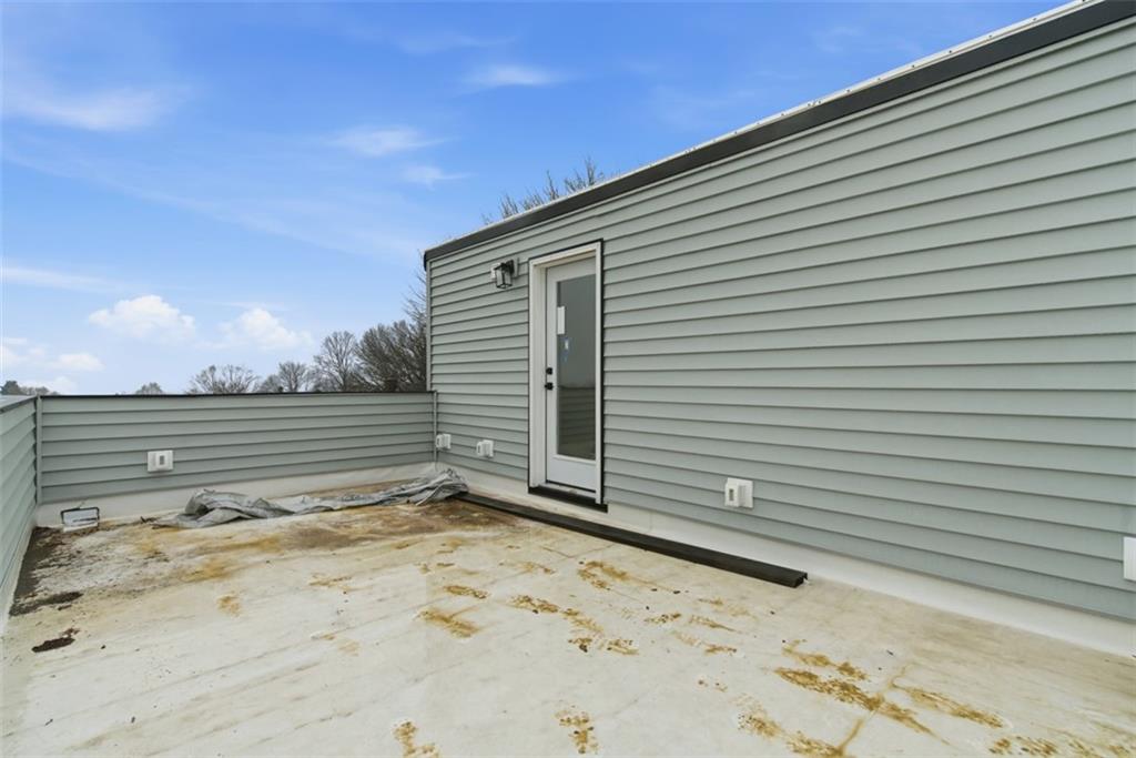 1361 Hawthorne Street Pittsburgh, PA 15201 - Photo 43 of 50 a view of a wooden door and a yard