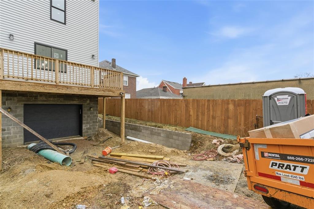 1361 Hawthorne Street Pittsburgh, PA 15201 - Photo 46 of 50 a view of a backyard with a wooden fence