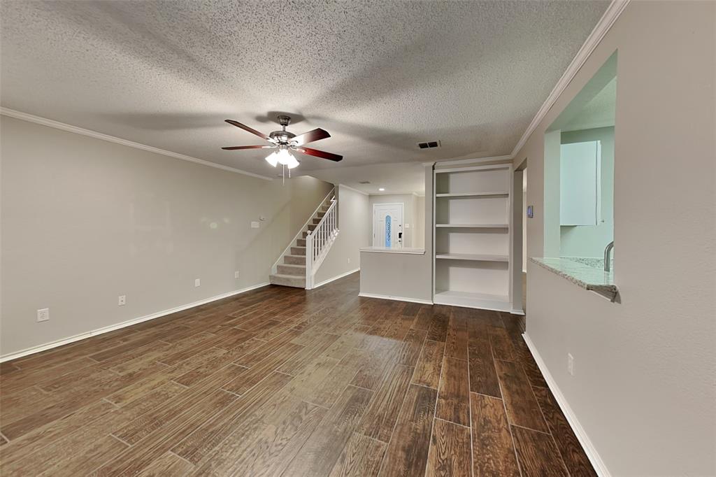 308 Cortland Circle Roanoke, TX 76262 - Photo 5 of 21 wooden floor in an empty room with a window