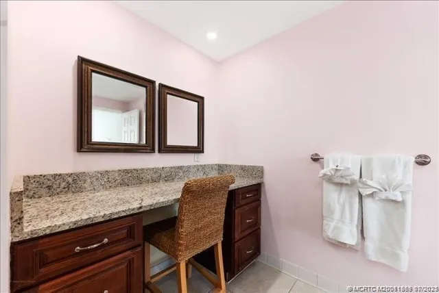 a view of a kitchen with granite countertop and sink