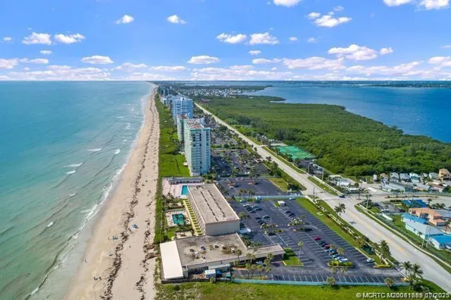 a view of an ocean and a building