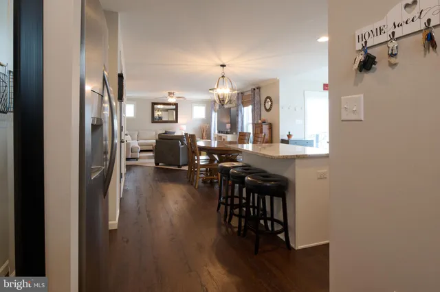 a bedroom with a bed and a workspace