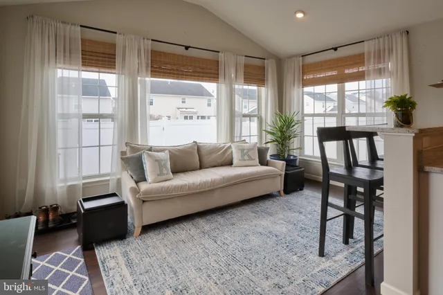 a bedroom with a bed and a television